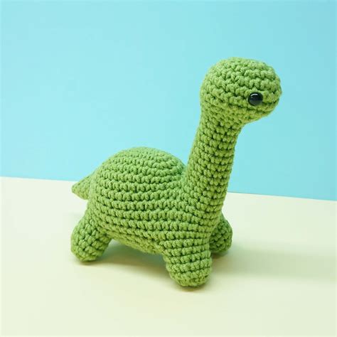 Get ready to crochet your very own adorable dinosaur with this Dinosaur Baby #5 crochet pattern! The pattern includes easy-to-follow instructions and photos, making it perfect for beginners. With a finished height of 3.9 inches, this little dino is the perfect size for little ones to cuddle and play with.